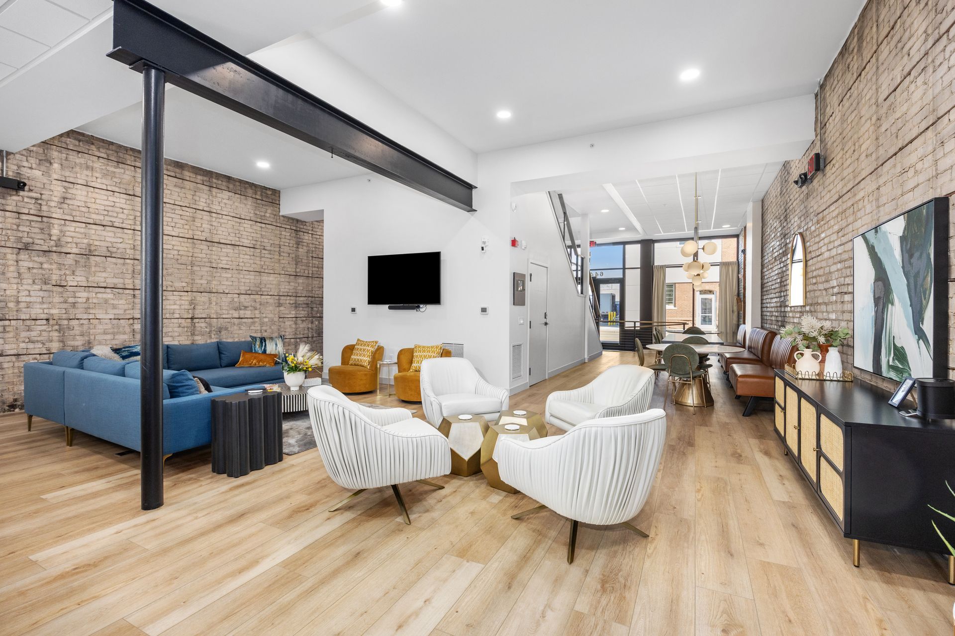 A living room filled with furniture and a flat screen tv.