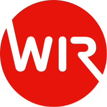Ein weisses Logo mit den Buchstaben „WIR“ in einem ausgefüllten roten Kreis.