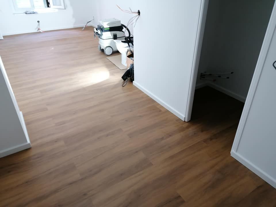 Pose de parquet par la société AIX Toiture