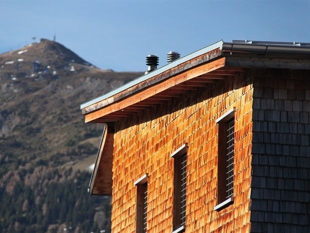 Fassadenbau Wohngeschäftshaus Bergamin AG / Schindelfassade