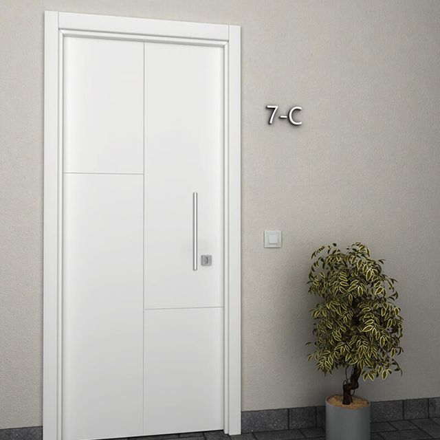 Una puerta blanca con el número 7c.