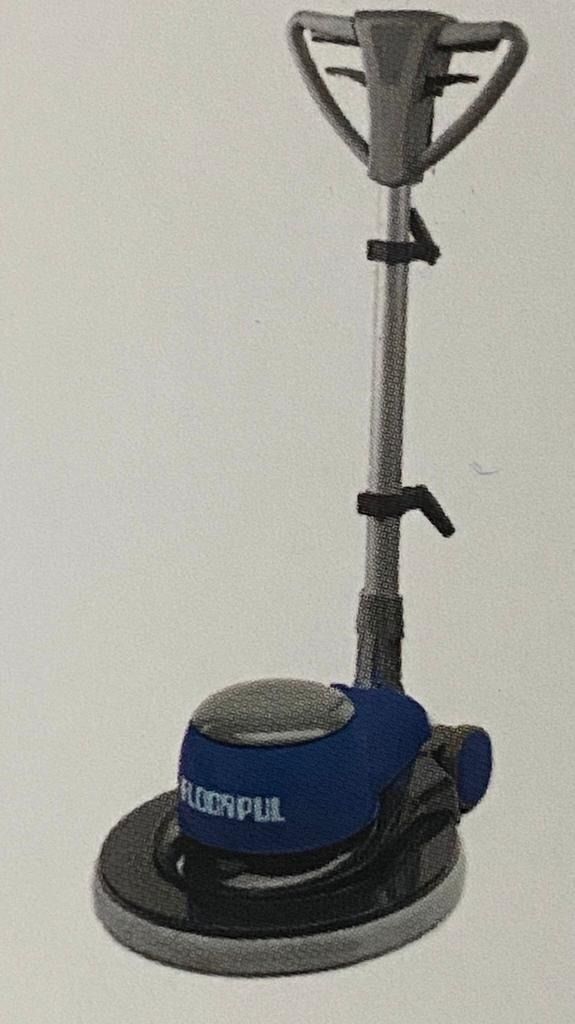 Una máquina azul y blanca está sentada sobre una superficie blanca.