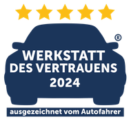 Eine Autosilhouette mit dem Schriftzug „werkstatt des vertrauens 2024“ darauf.