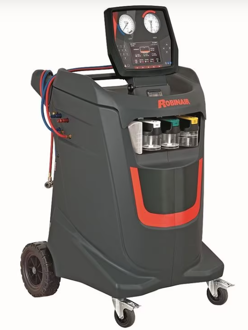 Eine schwarz-rote Maschine mit einem Monitor darauf