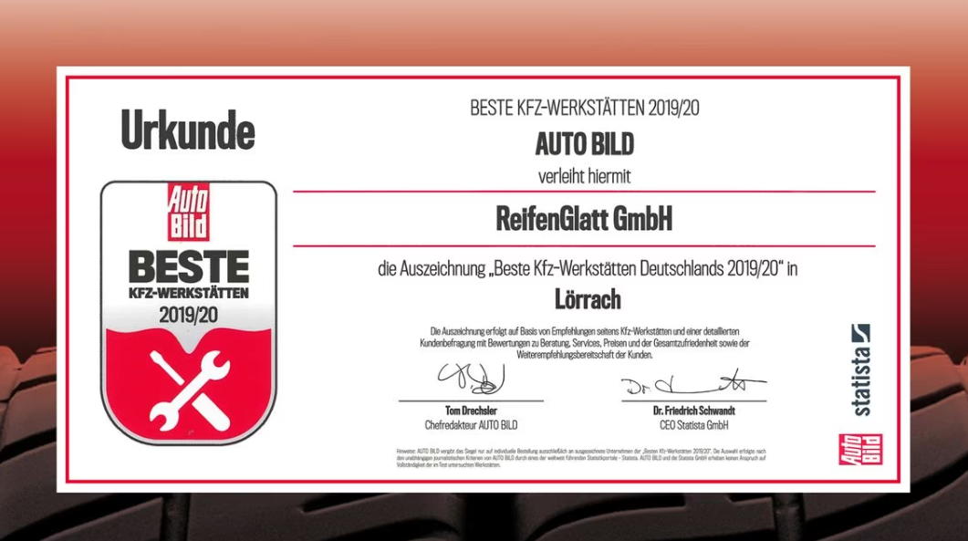 Eine rot-weiße Urkunde mit der Aufschrift „Beste“