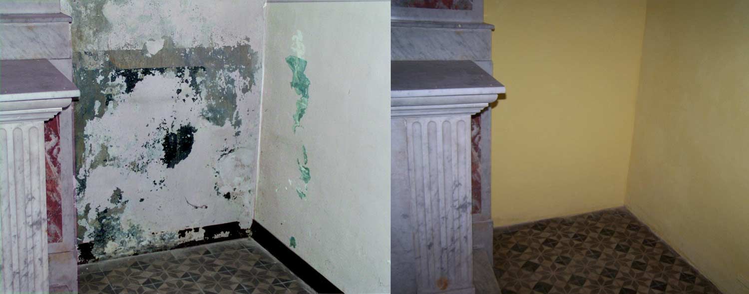 Coin intérieur endommagé avec peinture écaillée, murs fissurés et sol carrelé.