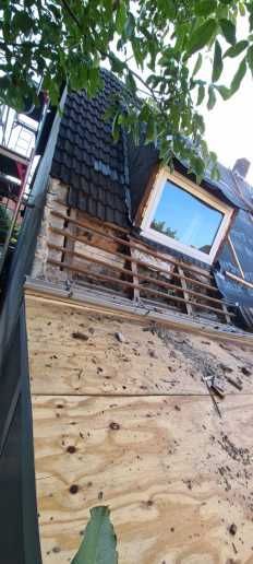 Satteldachumdeckung Holz