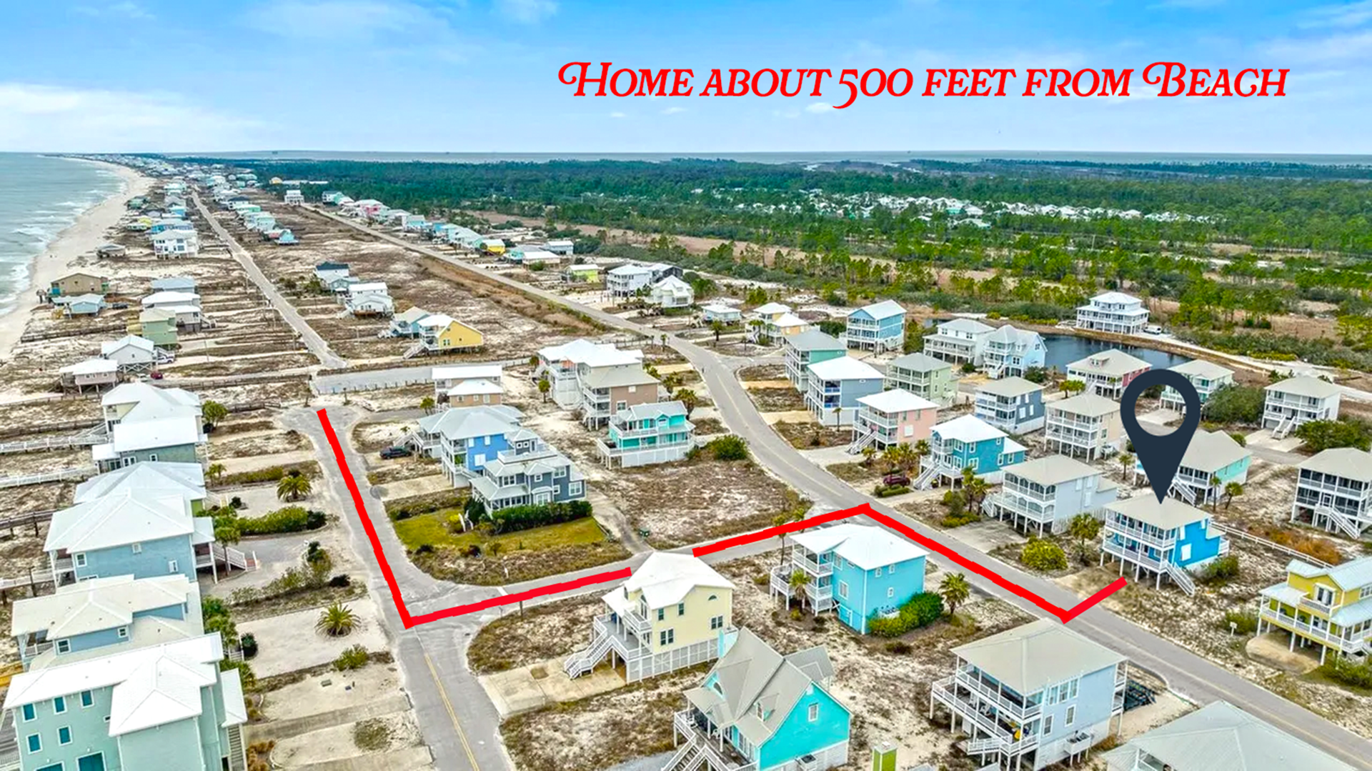 Aerial view of coastal neighborhood with red route lines and text “Home about 500 feet from Beach”