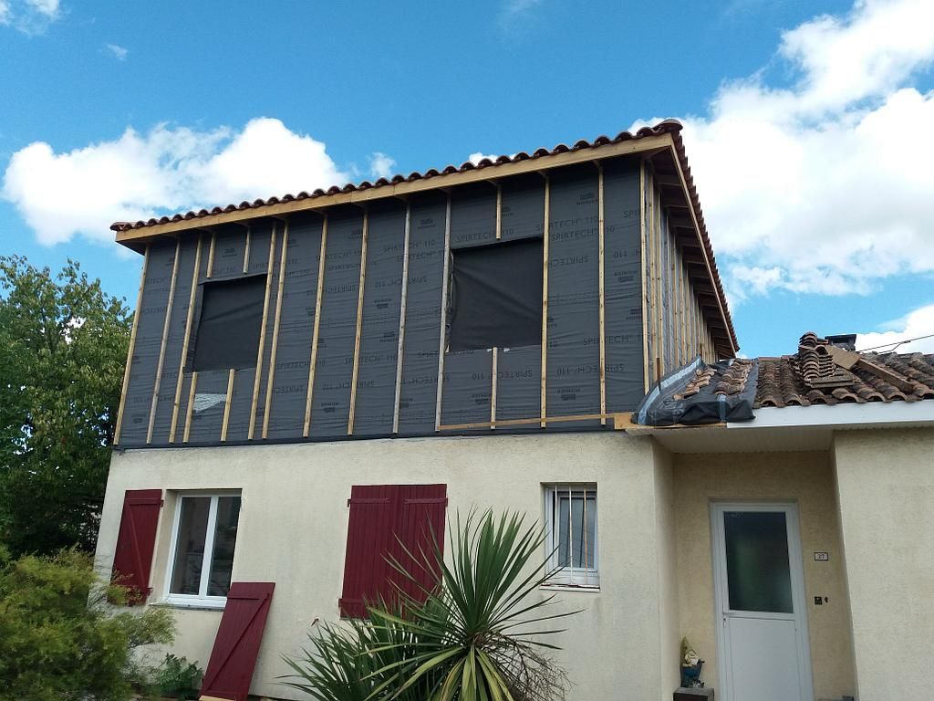 Maison avec rénovation de charpente et façade