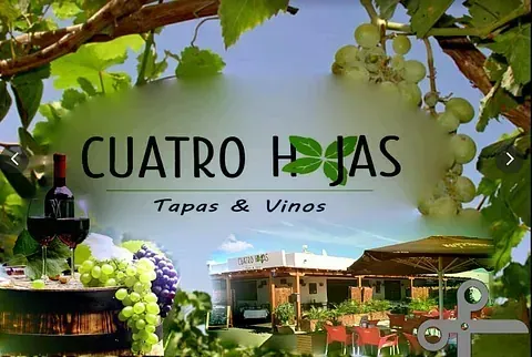 A sign that says cuatro hojas tapas & vinos