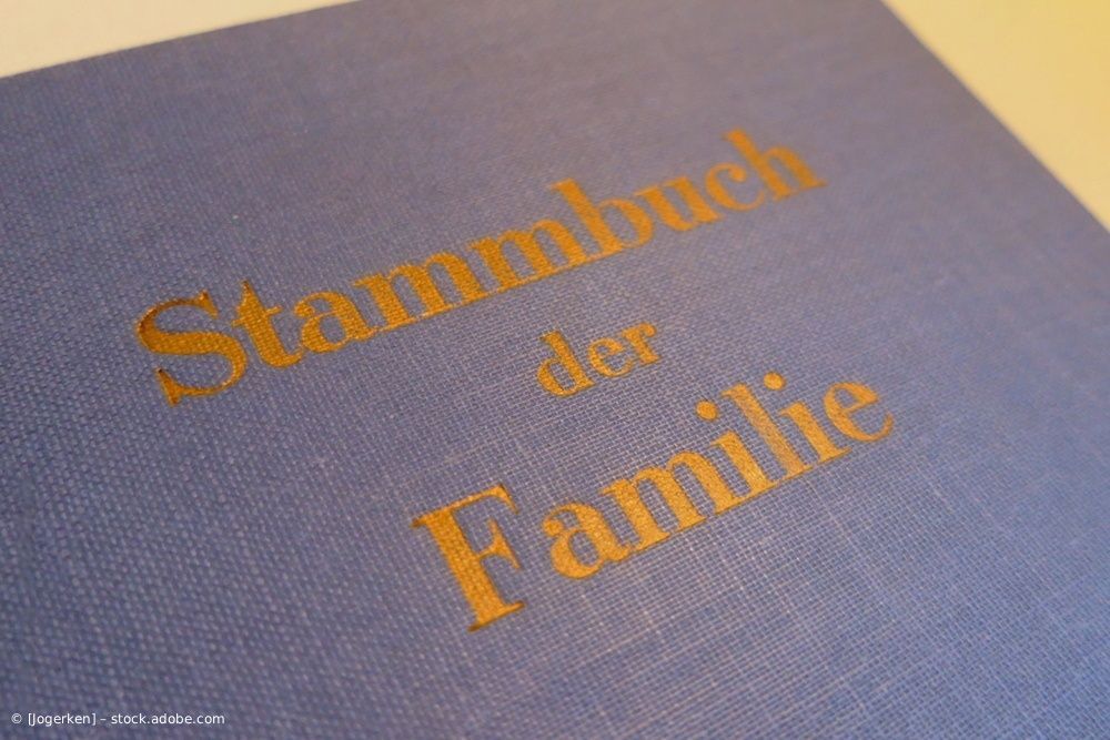 Blue book with gold lettering: 