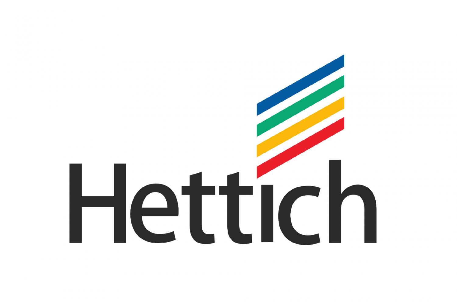 Logotipo de Hettich con texto y una pila de rayas angulares de colores.