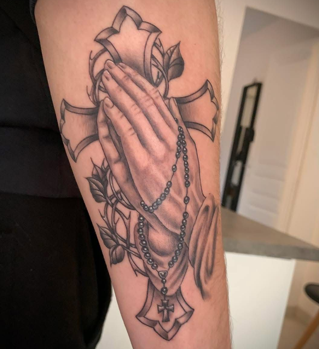 Un tatouage sur l'avant-bras d'une personne