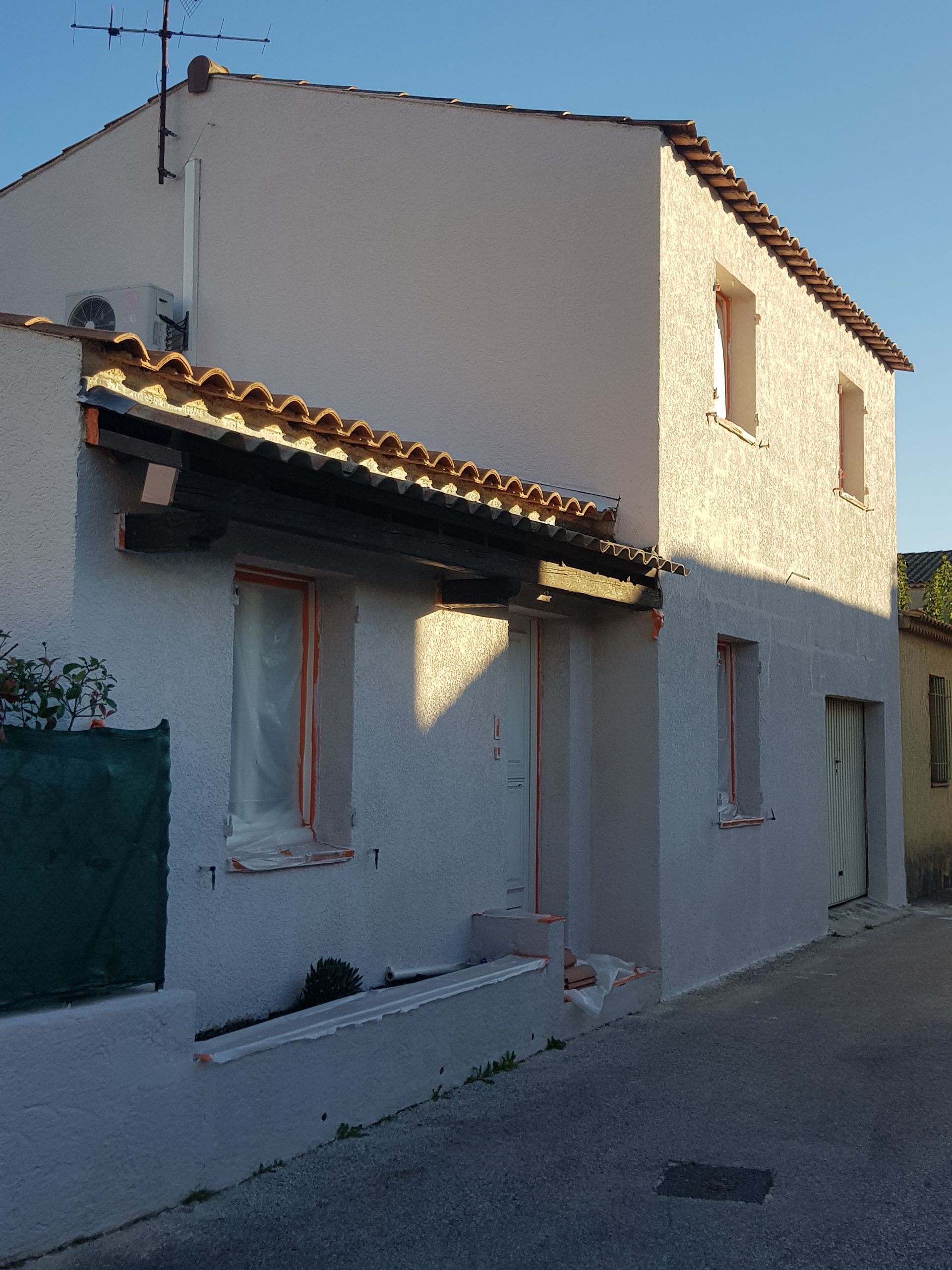 Le ravalement de façade d'une maison à étages
