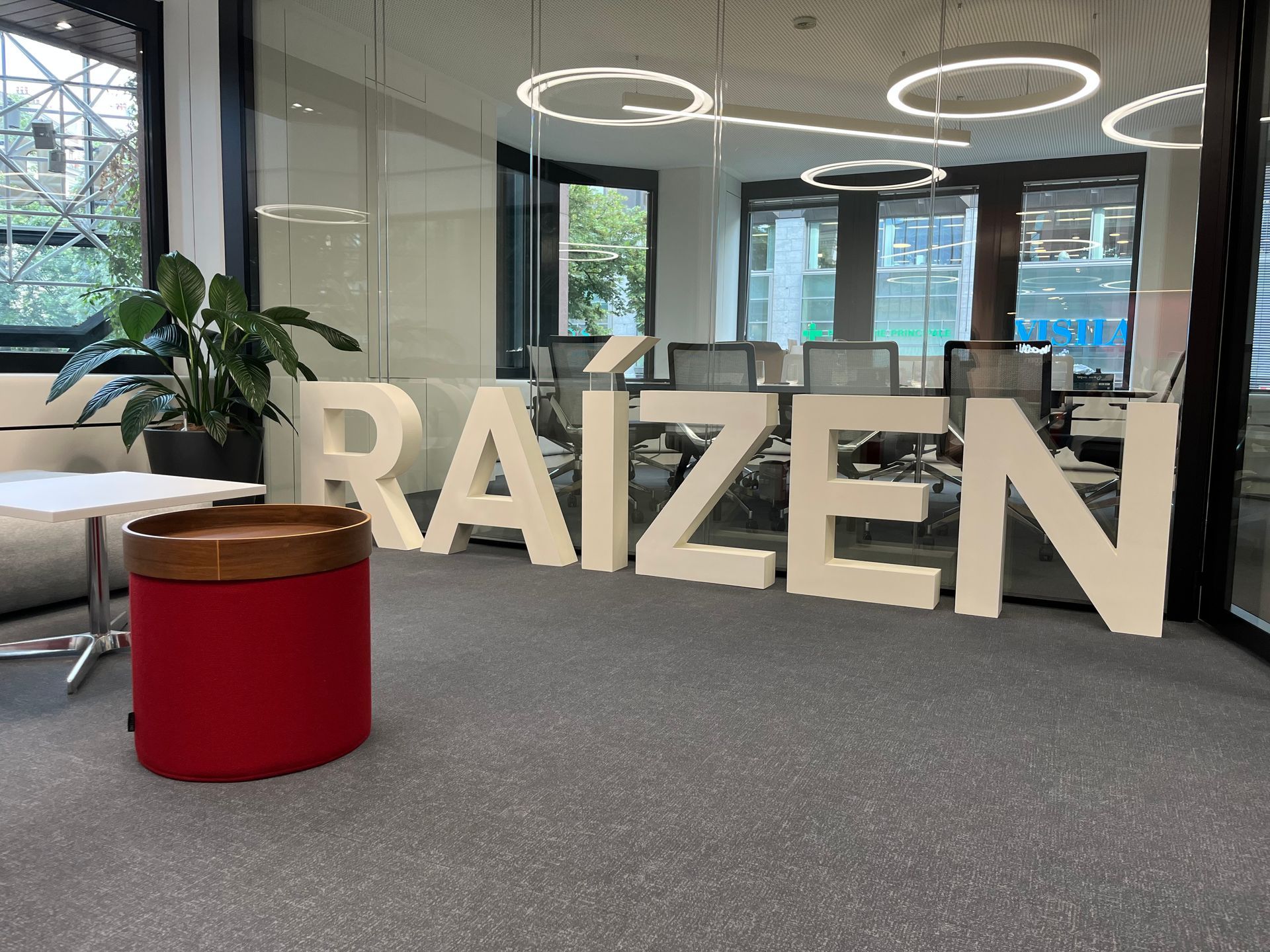 The word raizen is on the floor in a room