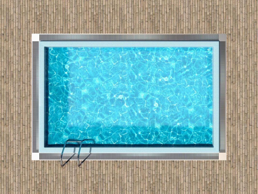 Vue plongeante d'une piscine rectangulaire aux eaux bleu clair, entourée d'une terrasse en bois brun clair.