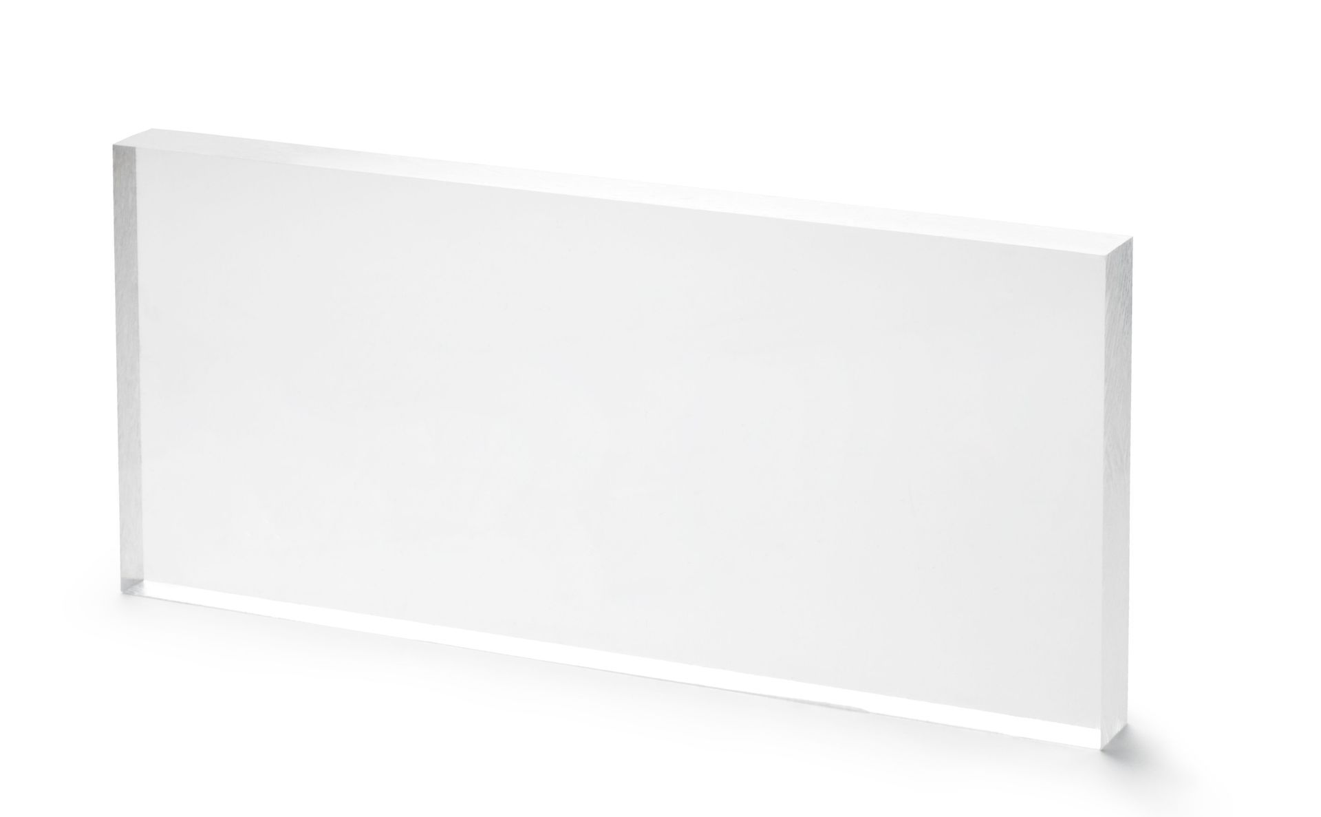 Bloque de acrílico transparente, rectangular con interior blanco, que proyecta una ligera sombra sobre fondo blanco.