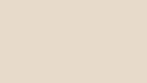Un primer plano de un fondo blanco con una textura simple.