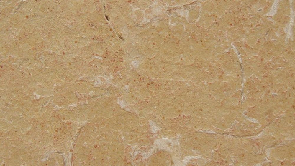 Un primer plano de un trozo de papel con textura de mármol.