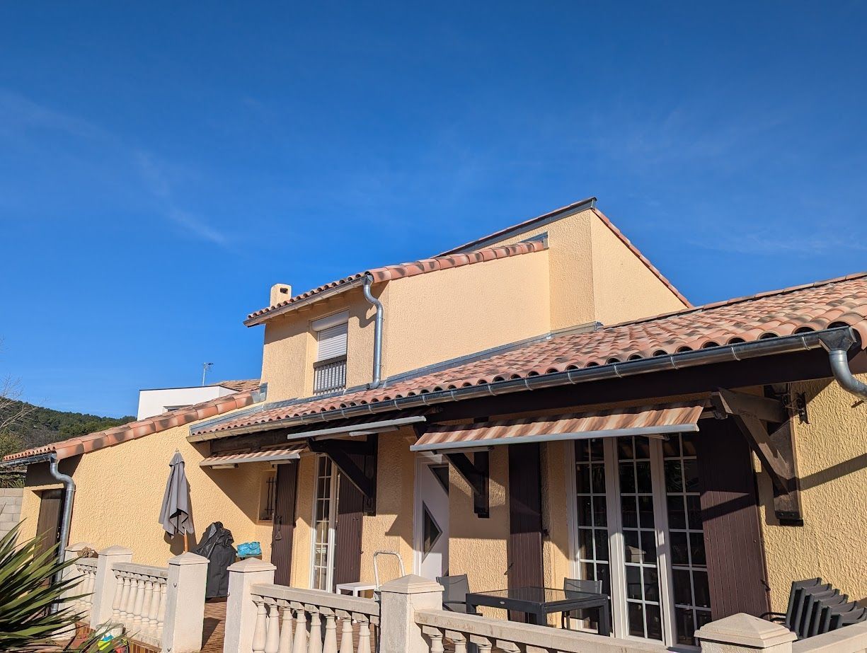 rénovation toiture gouttière isolation