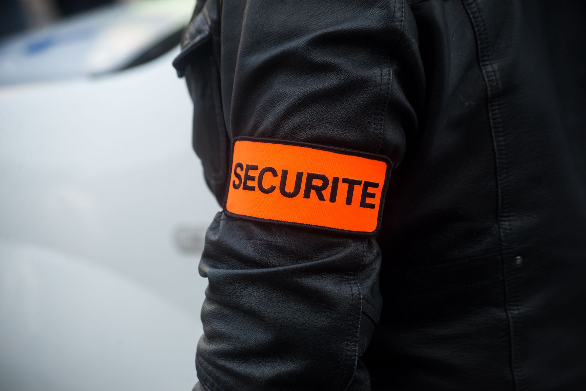 Brassard orange d'agent de sécurité