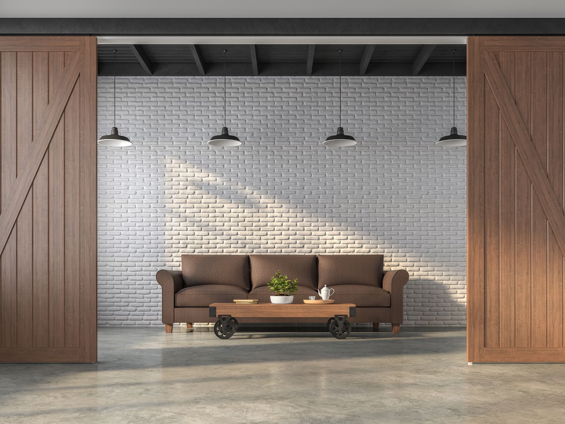 Salon moderne avec un canapé marron, une table basse et des suspensions sur un mur de briques beiges.