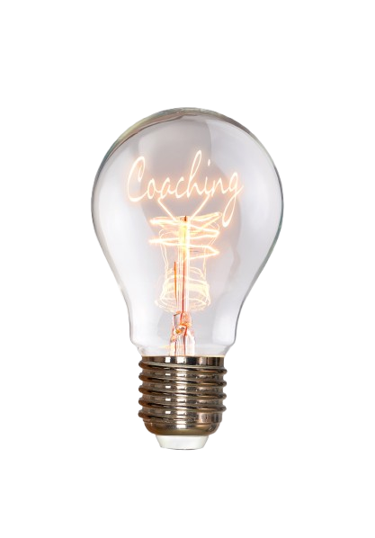 Ampoule transparente avec filament incandescent et le mot Coaching à l'intérieur.