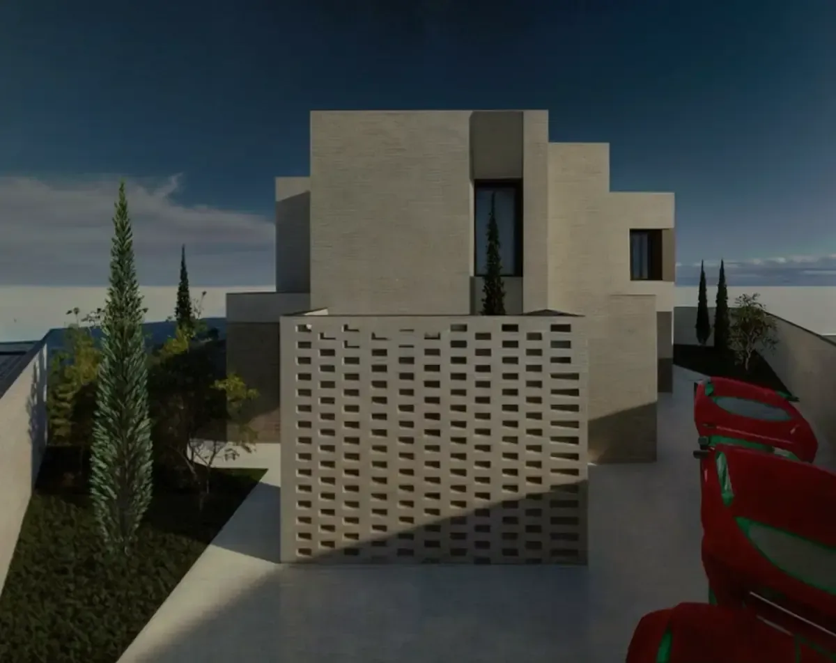 Edificio moderno de color beige con paredes estampadas, árboles pequeños y asientos rojos sobre una superficie blanca.