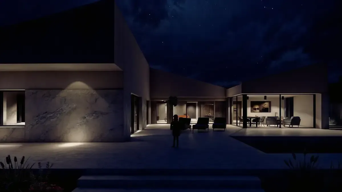 Exterior de una casa moderna de noche, iluminado. Una persona camina hacia la puerta iluminada. Cielo oscuro con estrellas.