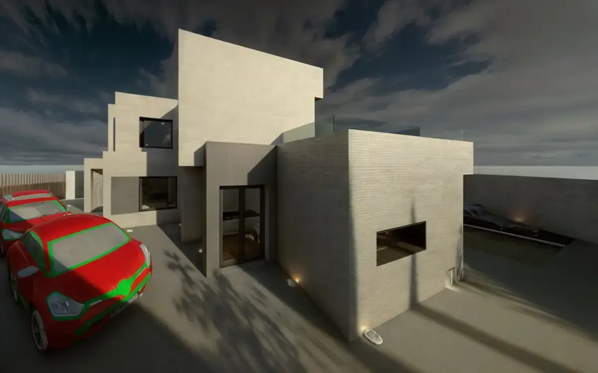 Casa blanca moderna con un coche deportivo rojo en la entrada en un día soleado.