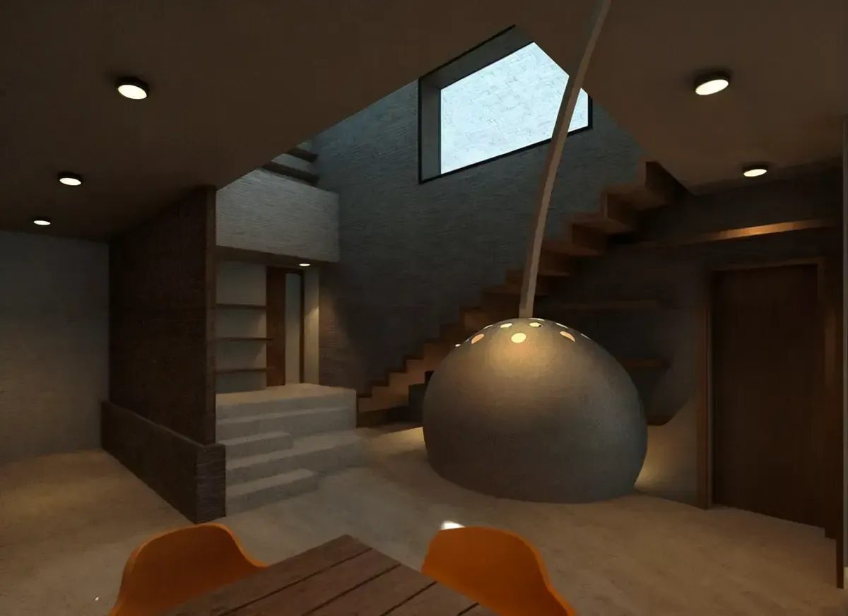 Interior de una casa moderna con escaleras, una gran lámpara y sillas naranjas.