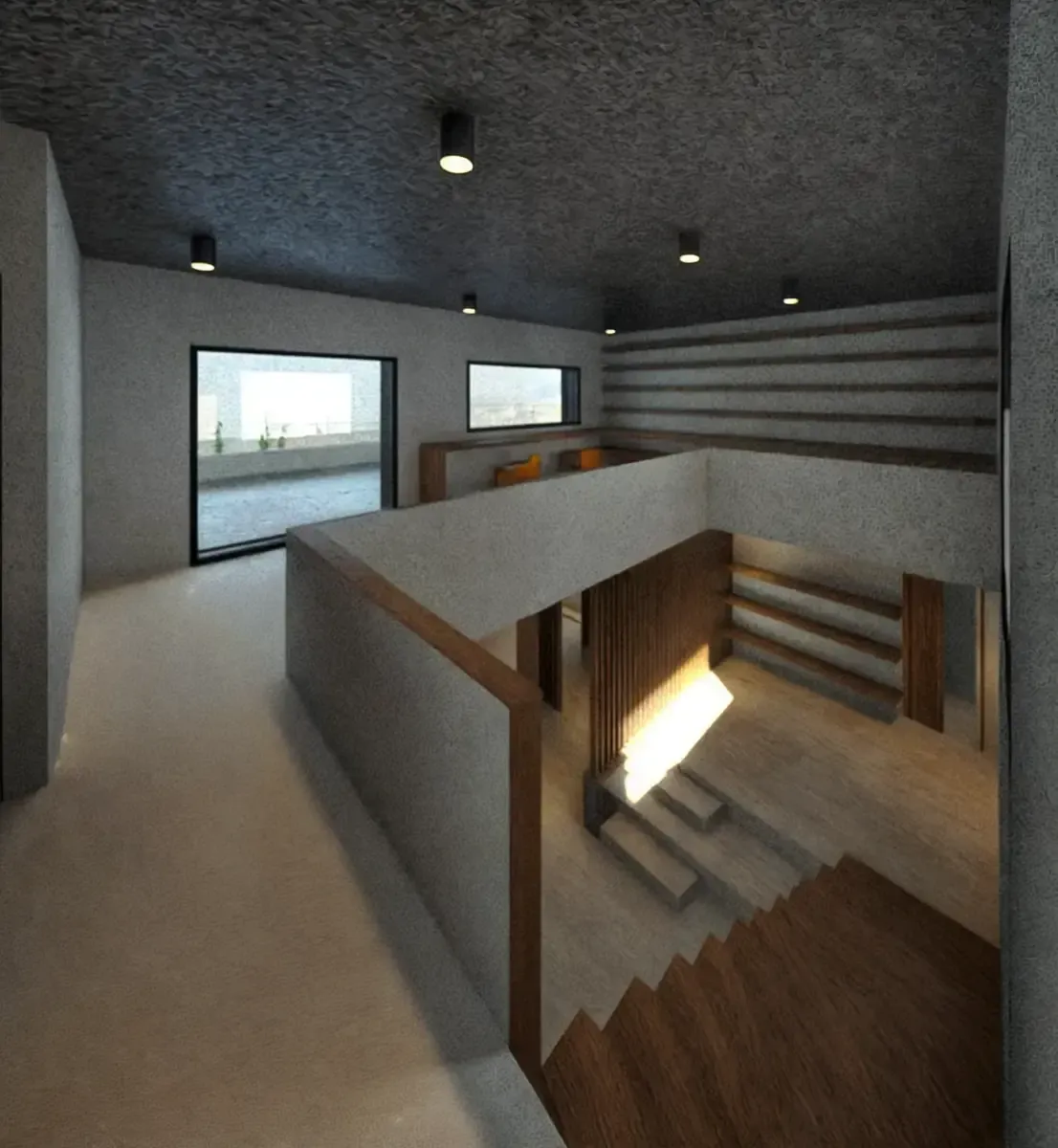 Vista interior de un edificio moderno con paredes de hormigón y escaleras de madera. Entra luz natural.