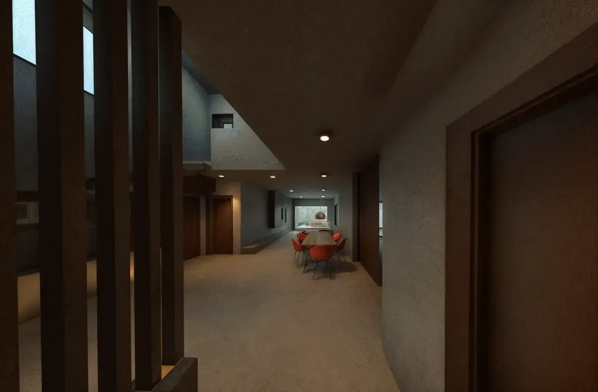 Pasillo interior con lamas de madera verticales a la izquierda, que conduce a puertas y a un carrito médico.