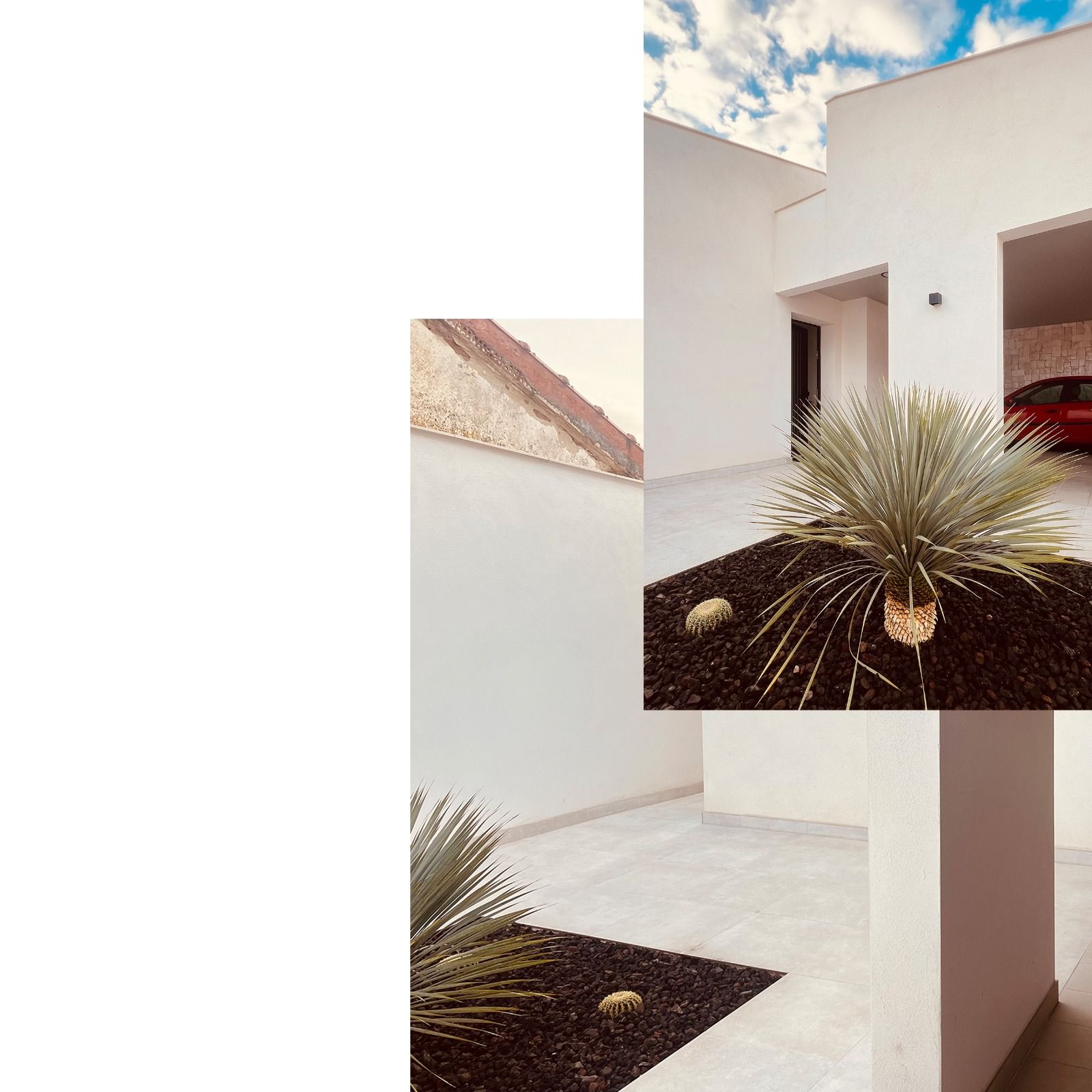 Moderna casa blanca con jardín paisajístico y coche rojo en el garaje.