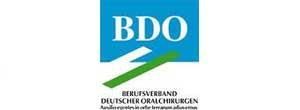 Das BDO-Logo ist blau und weiß mit einem grünen Pfeil.