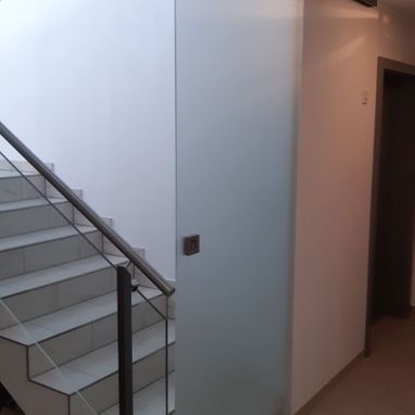 Schiebetür um Katzen aus dem Wohnbereich fern zu halten