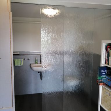 Raumteiler als Schiebetür