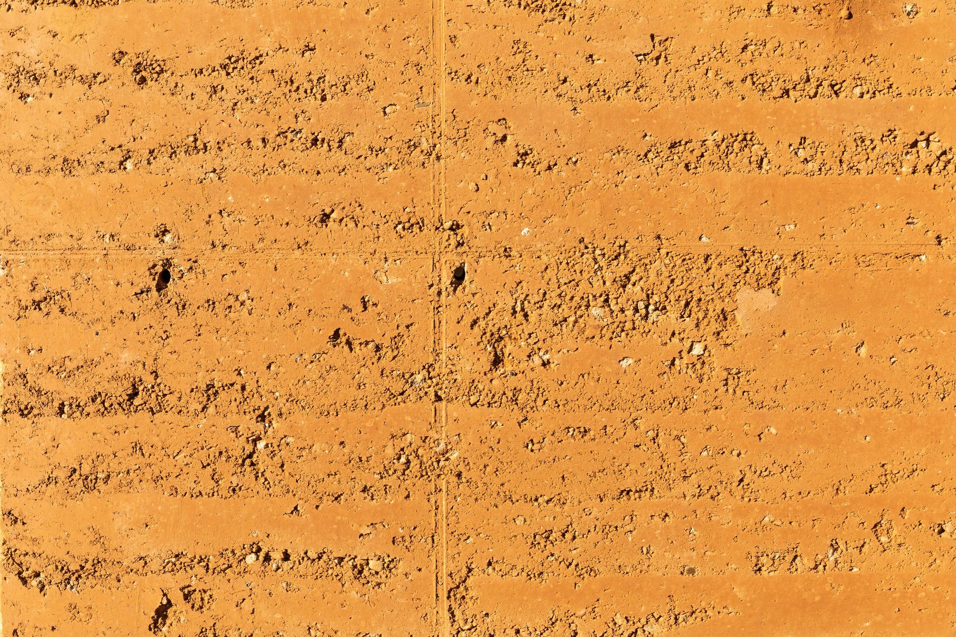 Mur créé en utilisant la technique du pisé