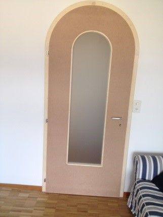 porta di ingresso in legno e vetro