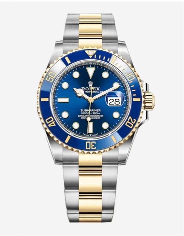 Un reloj Rolex de plata y oro con esfera azul.