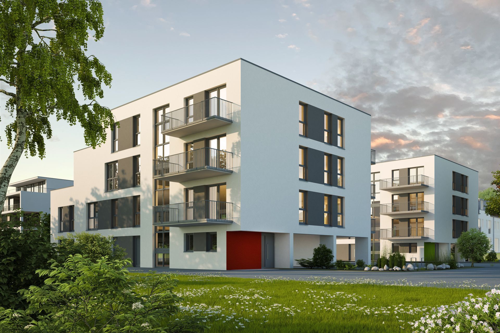 Façade d'un immeuble de logements collectifs avec des balcons.