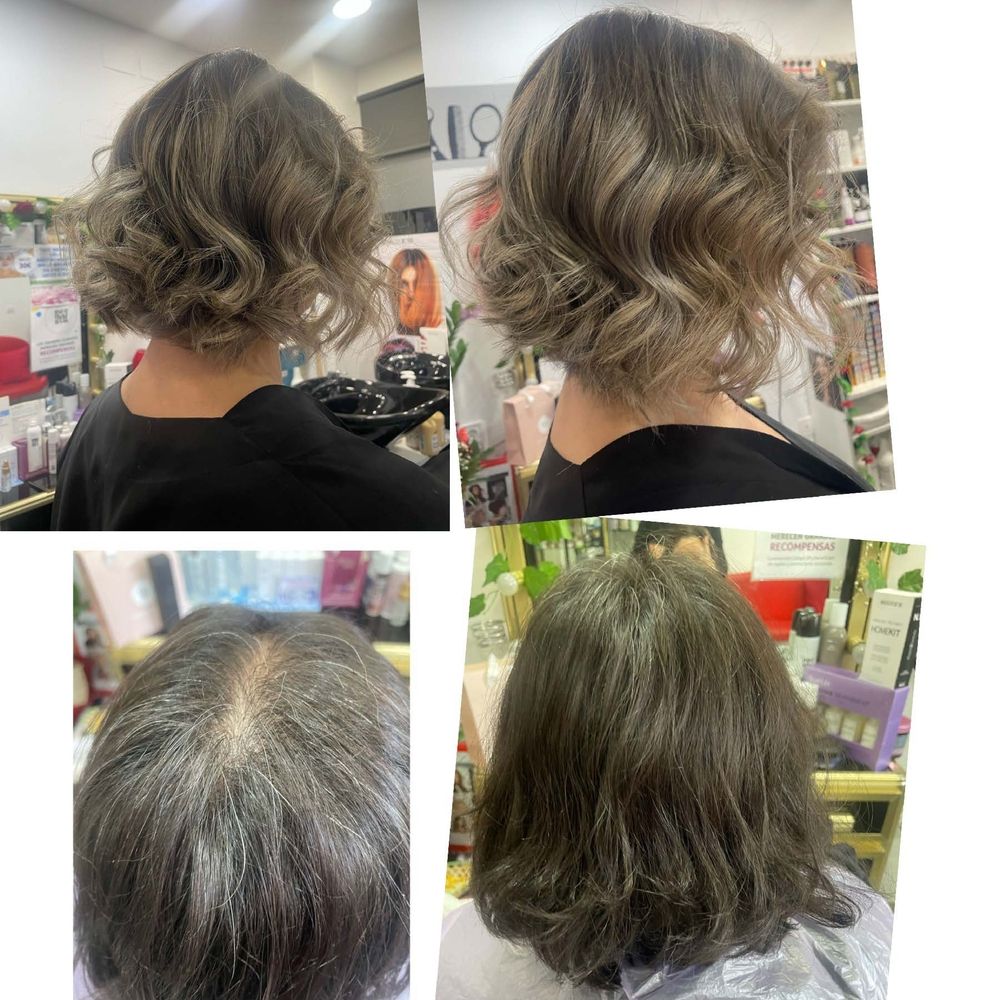 Una mujer se está cortando el pelo en un salón.