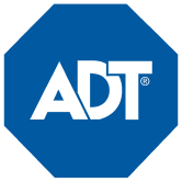 El logotipo de ADT está en un octágono azul sobre un fondo blanco.