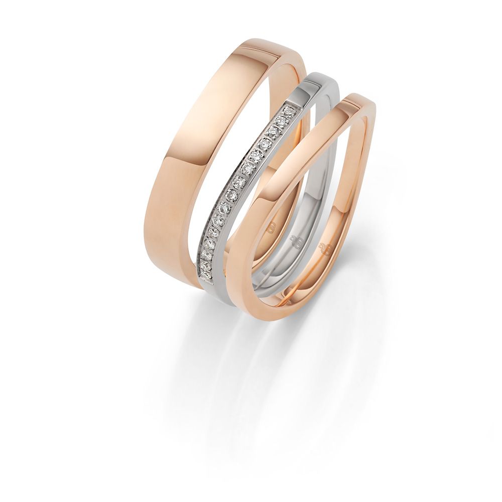 Roségoldener Ring für den Mann und zwei dezente Ringe für die Frau, in Silber mit kleinen Diamanten und in Roségold