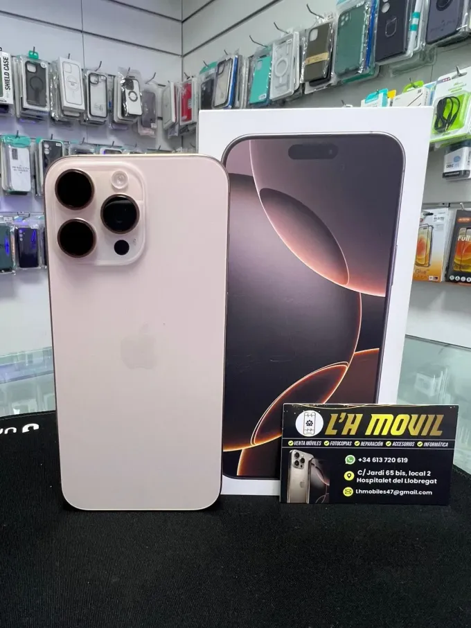 IPhone Pro rosa junto a su caja con un cartel de tienda.