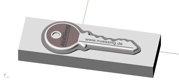 Ein 3D-Modell eines Schlüssels auf einem Blatt Papier.