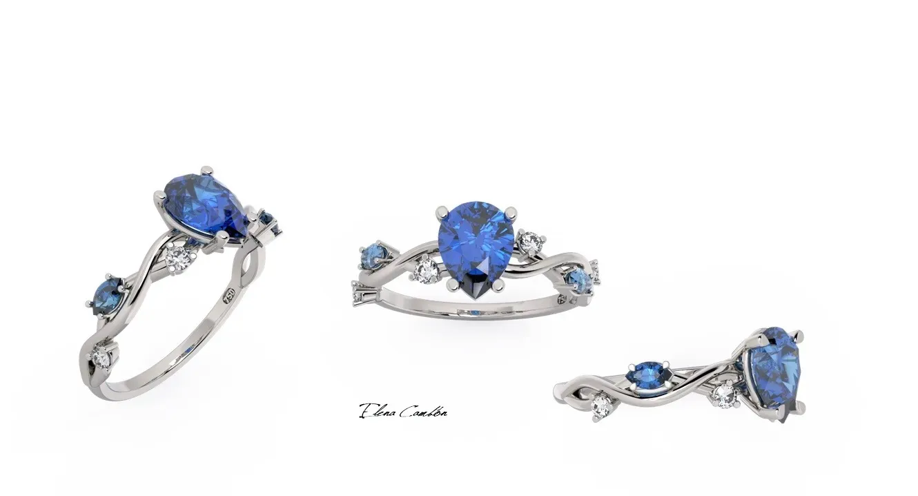 Anillo de plata con gema azul, mostrado desde múltiples ángulos sobre un fondo blanco.