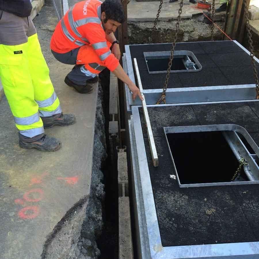 Pose de conteneurs enterrés