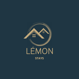 Logo de Lemon Stays: deux toits de maison beiges à l'intérieur d'un cercle doré brossé sur fond bleu foncé. Texte: «Lemon Stays».