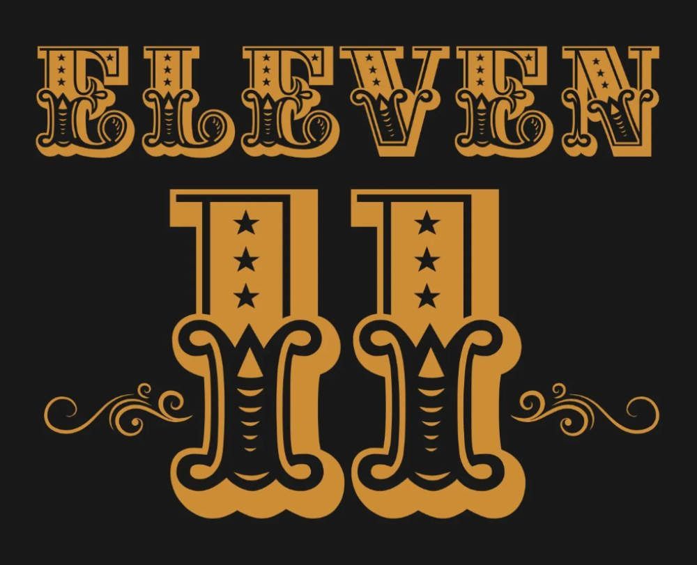 Texto "ONCE" y grandes n&uacute;meros "11", dorado sobre fondo negro; detalles decorativos.